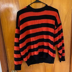 Vogue Men's Black and Red Striped Crewneck Sweater